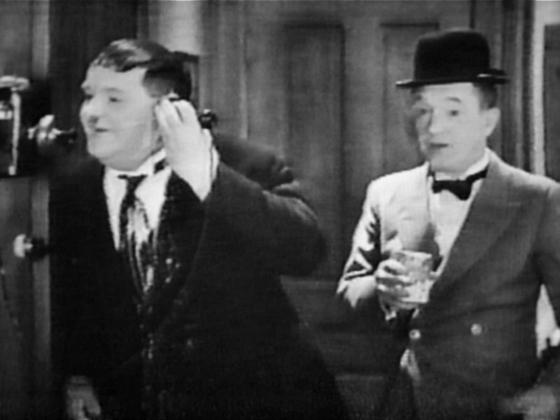 Oliver Hardy saying 'Excuse me please.  My ear is full of milk.' excusemeplease_800.jpg (48K)